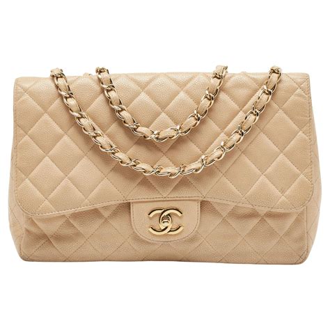 chanel beige caviar flap